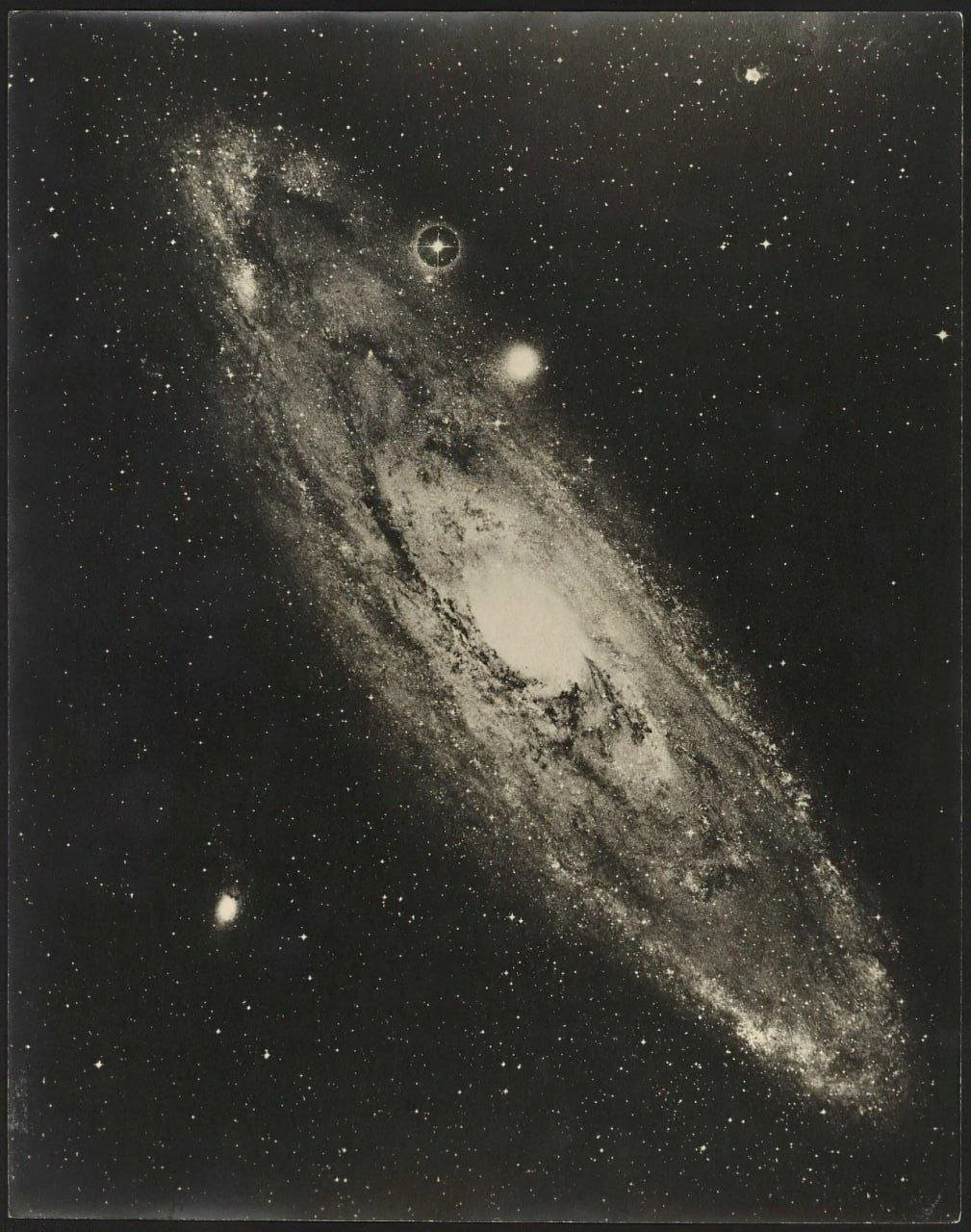 Vintage Photograph of Andromeda Galaxy from 1950s

A historic snapshot of the Andromeda Galaxy captured in the 1950s by the Mount Wilson Observatory in California showcases the stunning beauty of our neighboring galaxy. This photograph serves as a testament to the advancements in astronomical imaging technology during that era.

The image provides a glimpse into the past, offering a unique perspective on the galaxy that has fascinated astronomers and stargazers for centuries. The Andromeda Galaxy, also known as M31, is located approximately 2.537 million light-years away from Earth and is the closest spiral galaxy to our Milky Way.