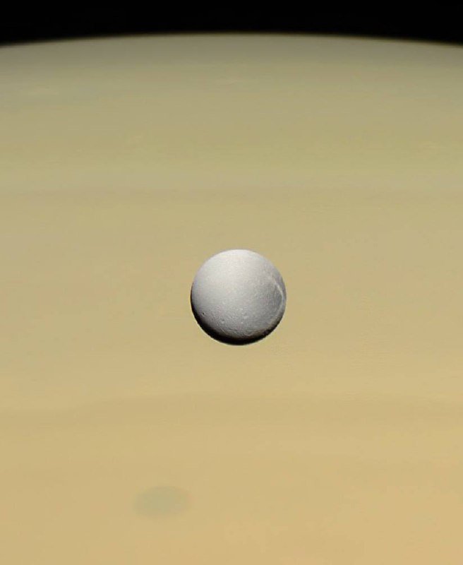 Saturn's moon Dione Shines Against Gas Giant's Atmosphere

Saturn's moon Dione was captured against the backdrop of the gas giant's yellowish atmosphere by the spacecraft Cassini in December 2005.