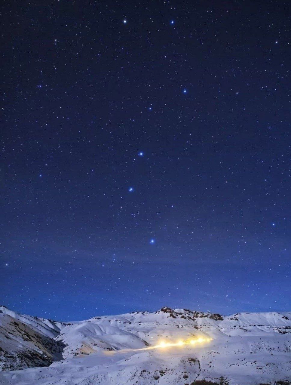 Big Dipper Shines Over Snowy Alborz Mountains

The breathtaking sight of the Big Dipper constellation shining brightly over the snow-covered Alborz Mountain Range in Iran captivates viewers with its natural beauty.

The iconic constellation's distinctive shape stands out against the clear night sky, creating a mesmerizing contrast with the snow-capped peaks of the Alborz Mountains, offering a serene and enchanting spectacle for all who witness it.