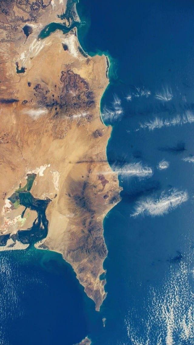 Feathery Clouds Above Pacific Ocean Captured from ISS

A mesmerizing photo taken from the International Space Station showcases delicate feathery clouds drifting above the Pacific Ocean near the Mexican coast. The image captures the serene beauty of nature as seen from space, highlighting the intricate patterns and textures of the clouds against the vast expanse of the ocean.

The photograph offers a unique perspective on the Earth's atmosphere and the interactions between different elements of the environment. It serves as a reminder of the stunning views visible from space and the awe-inspiring wonders of the natural world that can be observed from above.