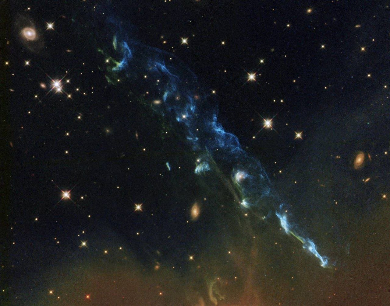 Hot Gas Geyser from New Star HH 110

Herbig-Haro object 110, also known as HH 110, is unique due to its solitary appearance, unlike most other objects of its kind that usually come in pairs. This hot gas geyser is an intriguing astronomical phenomenon.