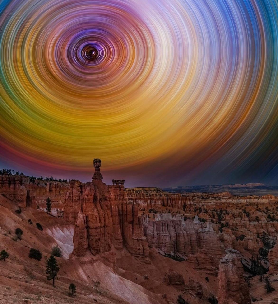 Starry Trails Above Thor's Hammer, Bryce Canyon, Utah

In the dark skies above Bryce Canyon in Utah, the majestic rock formation known as Thor's Hammer is illuminated by the starry trails. This natural wonder creates a mesmerizing spectacle as the stars streak across the night sky, contrasting with the silhouette of the iconic rock structure.

Visitors to Bryce Canyon National Park are treated to this breathtaking sight, where the celestial display adds an extra layer of magic to the already stunning landscape. The combination of the ancient rock formations and the cosmic dance of the stars above creates a truly unforgettable experience for all who witness it.