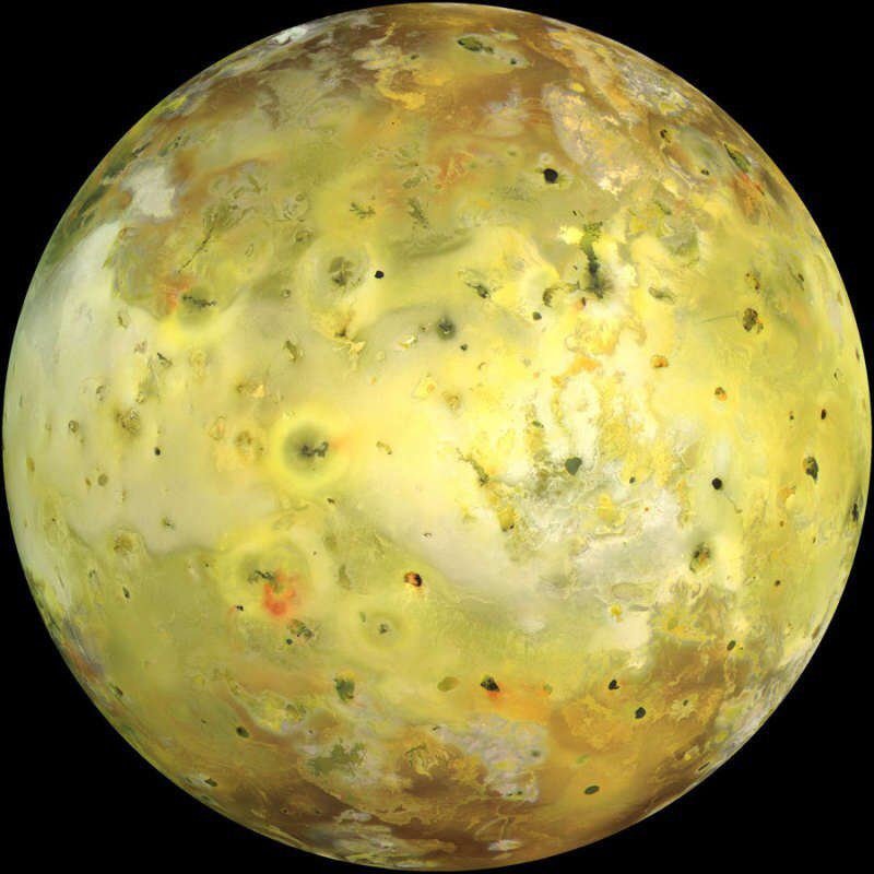 Unusual Moon of Jupiter: Io's Fiery Surface Revealed

The image captures Io, the most unusual moon of Jupiter, in vibrant yellow hues, showcasing its distinctive appearance shaped by sulfur and molten silicate rocks. Io's surface is in a constant state of renewal, driven by a network of active volcanoes that spew molten rock, creating a dynamic landscape.

Jupiter's immense tidal forces play a crucial role in shaping Io, causing intense volcanic activity that heats up the moon's interior, resulting in eruptions that illuminate its surface. The moon's volcanoes are exceptionally active, causing Io to glow brightly as they effectively turn the moon inside out with their extreme temperatures.