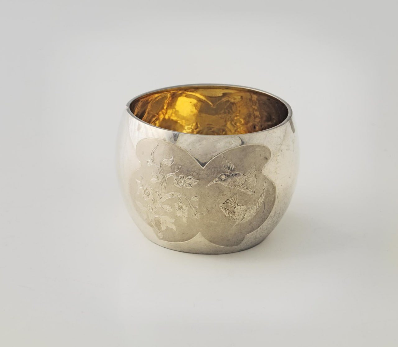 The History of a Silver Shot Glass

Crafted in England, London between 1882-1883 by artisan Ruper Favell, this silver shot glass showcases exquisite engraving, casting, and gilding techniques. Standing at a height of 4.8 cm with a diameter of 5.8 cm, this historical piece offers a glimpse into the craftsmanship of the era. The intricate details and fine workmanship on the shot glass make it a remarkable exhibit.

#exhibitoftheday

© Moscow Kremlin Museums